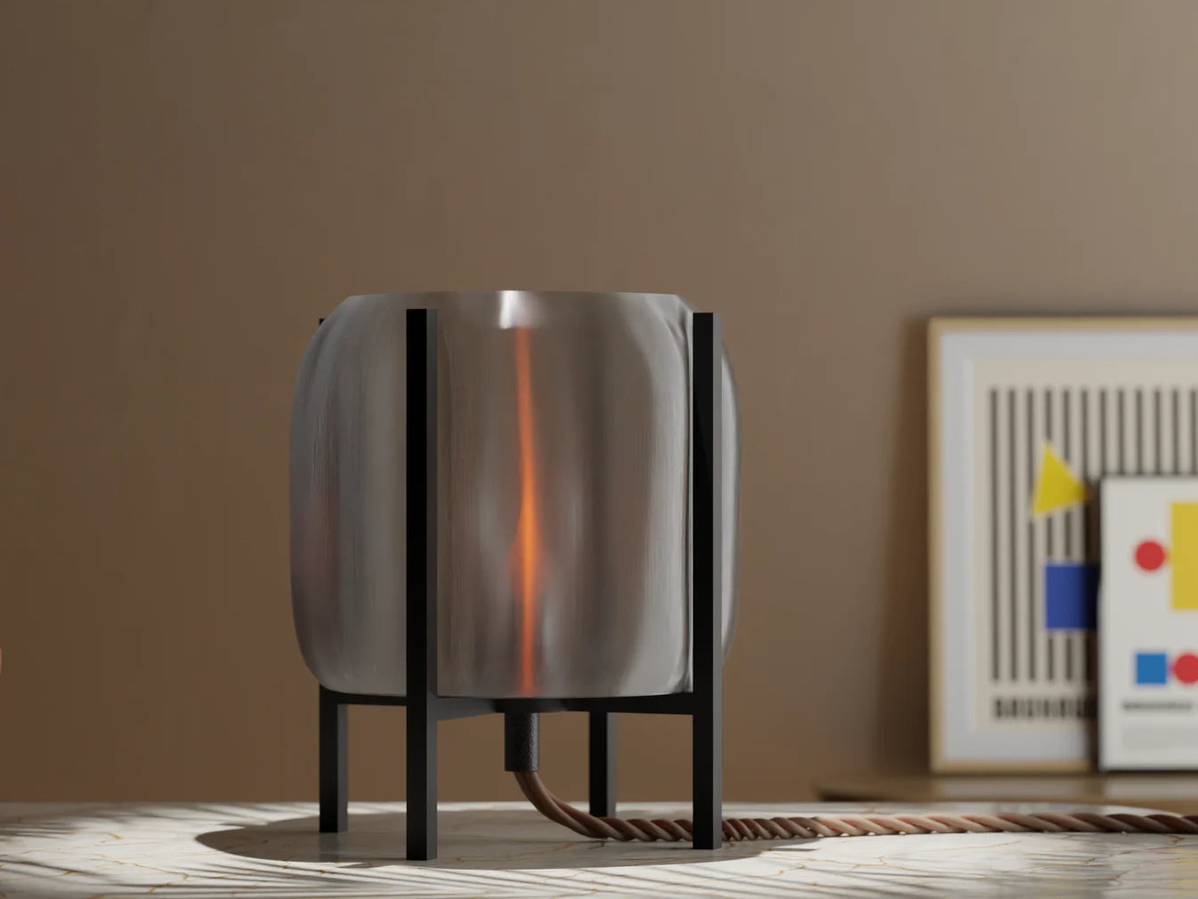 Modern lamp with a reflective shade on a wooden surface against a neutral wall.